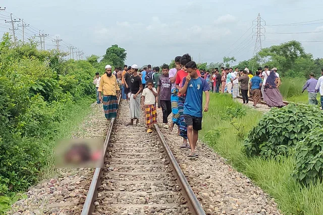 Five people have been killed in a train accident. Locals crowd at the spot after the incident. The picture is taken from Kamalpur area of Raipur upazila in Narsingdi today, Monday.